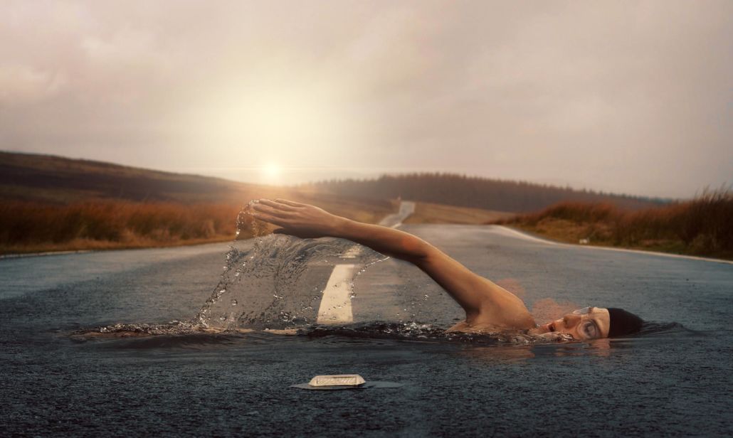 Film Editors visual effects still of a person swimming on asphalt