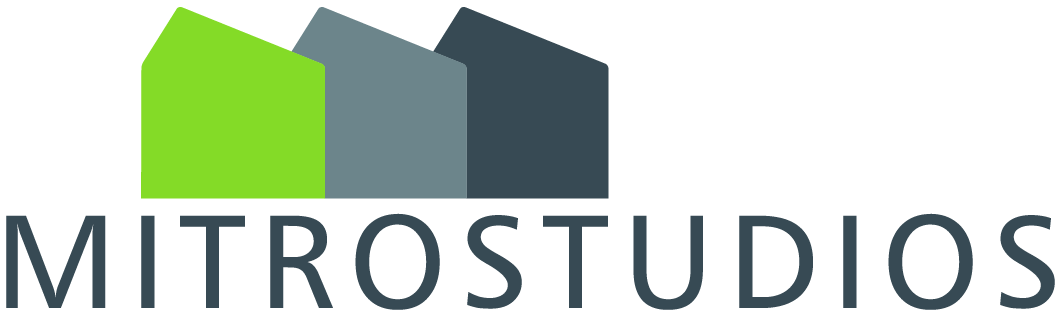 Mitrostudios logo shows the letters in a modern and soft font and with capital letters. Above them are three silhouettes of houses with a factory-like scheduled roof shape. These feature a color gradation from bright green on the left, to medium gray-blue in the middle, and to dark gray-blue on the far right.